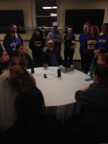 Ghost Hunter John Zaffis and UNE Students talking  to ghosts in Sutton Lounge