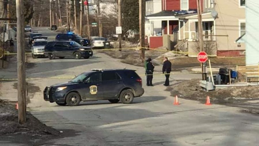 Police outside the Summer St. home investigate the shooting of a young girl. From https://wgme.com/news/local/police-shut-down-waterville-intersection